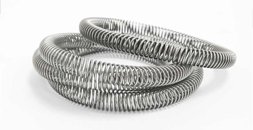 斜圈觸指彈簧，